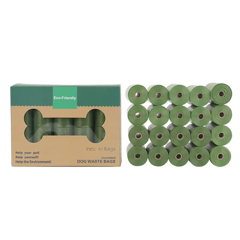 Rolls of green, black, blue, purple and orange degradable pet poo bags with a portable dispenser