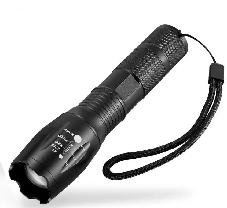 Black aluminium alloy zoomable LED flashlight with adjustable focus head for outdoor use.