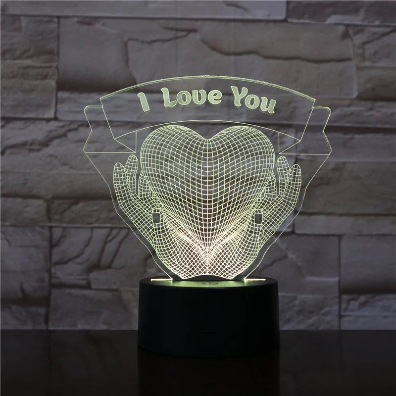 Valentine 3D night light with hands holding heart design in seven colour changing LED modes
