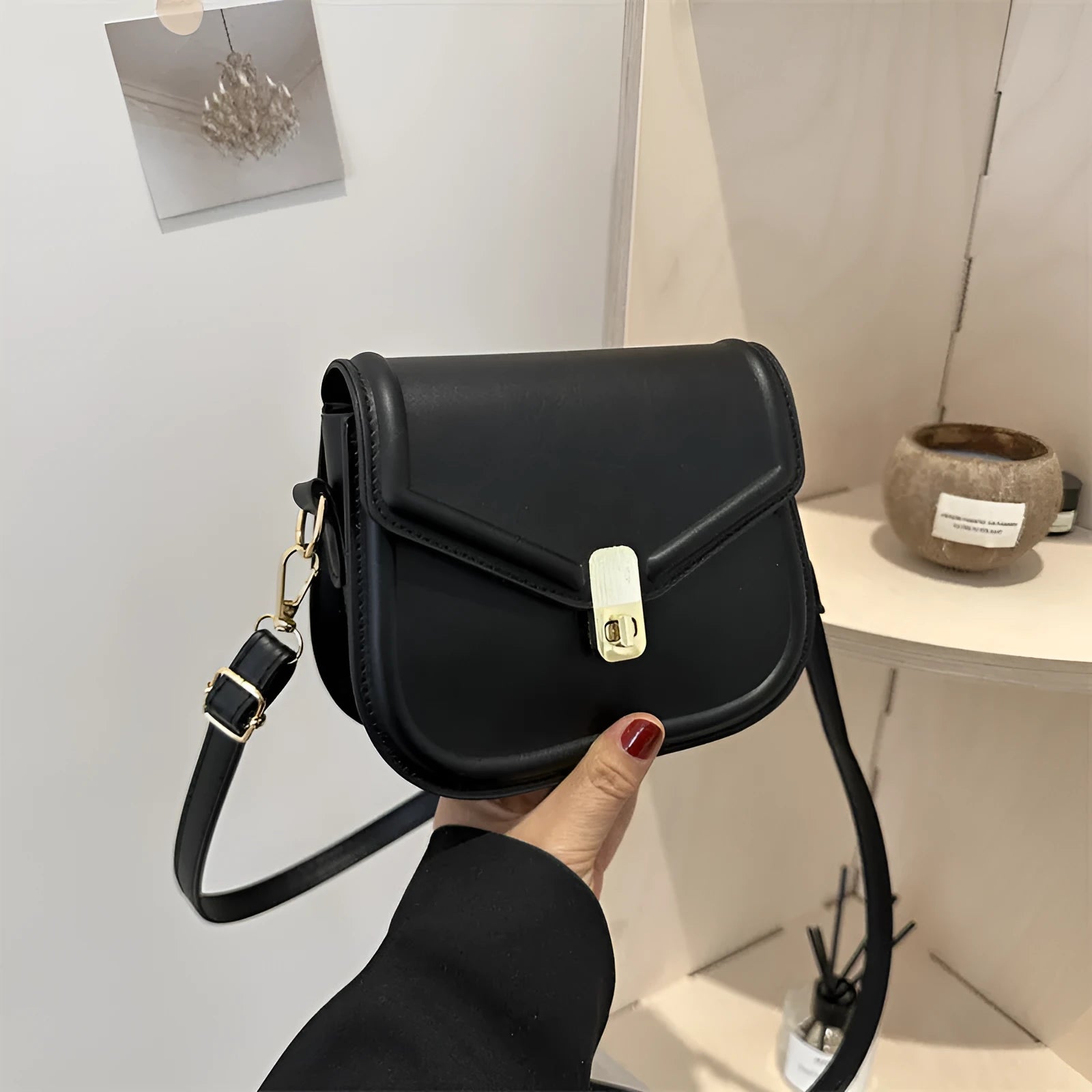 Soft PU leather horizontal square messenger bag with clamshell opening in khaki colour.