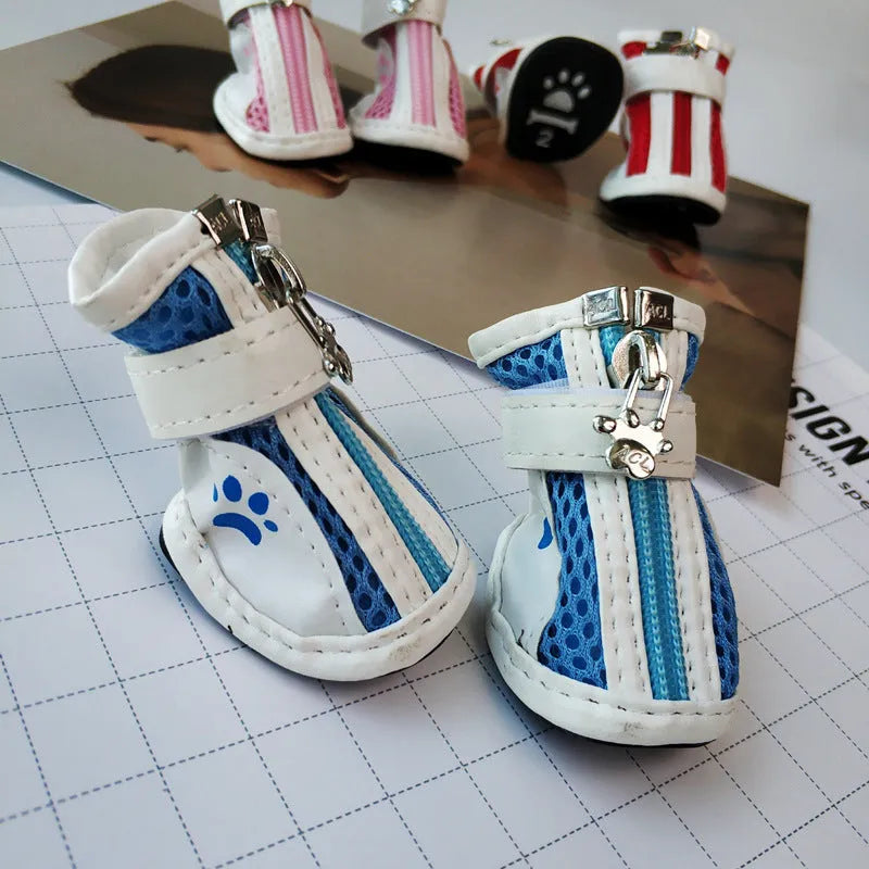 Blue zipper-closure dog shoes with non-slip soles from four-piece pet sneaker pack