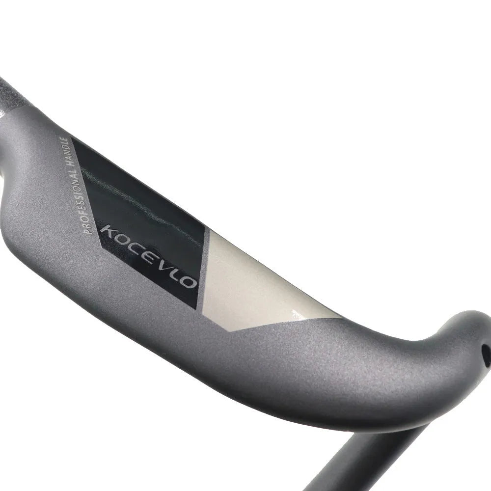 Wei Bike matt carbon fibre bent drop handlebar for road bikes showing ergonomic shape.