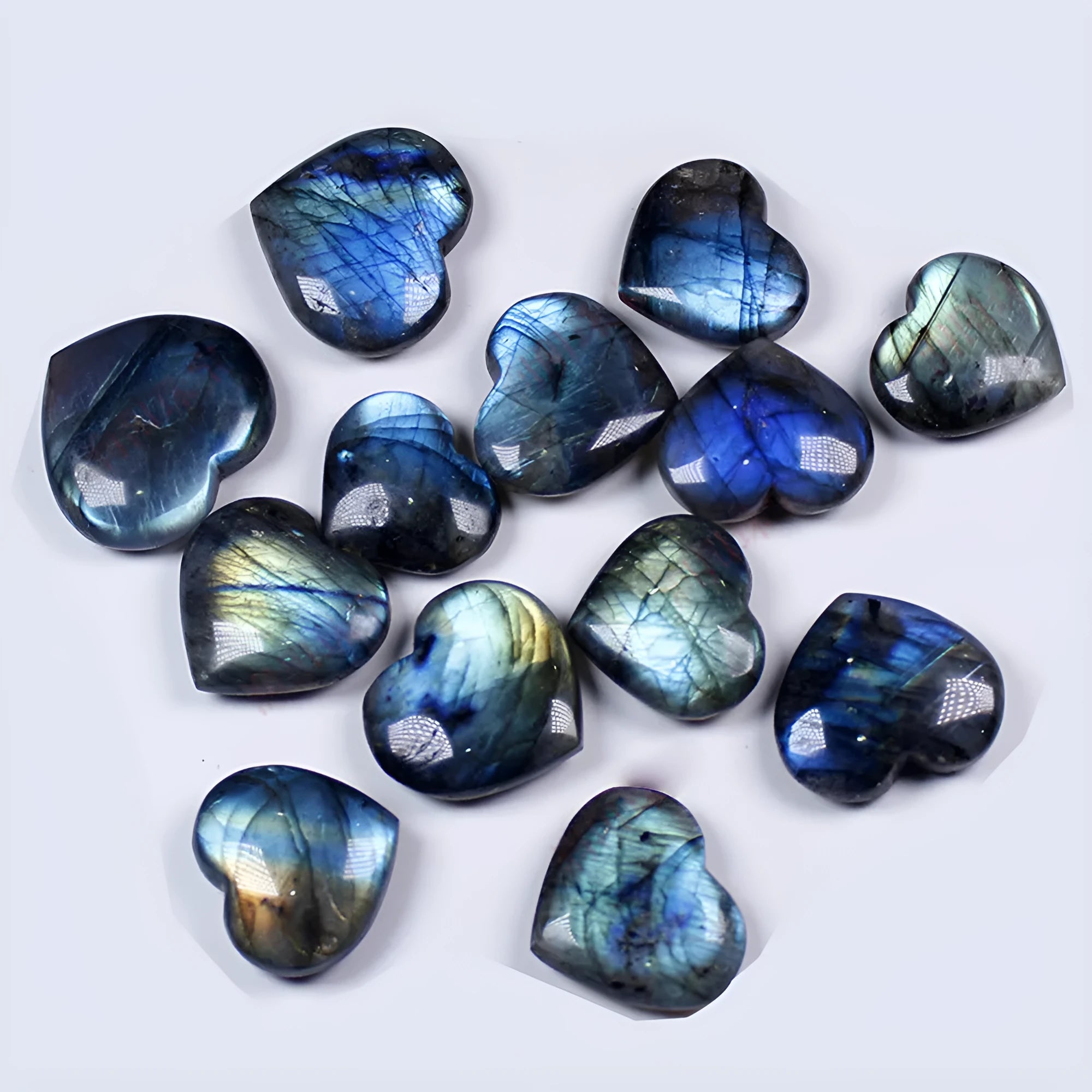 Natural pulled feldspar crystal heart pendant with handle design in blue moonlight colouration showing size options