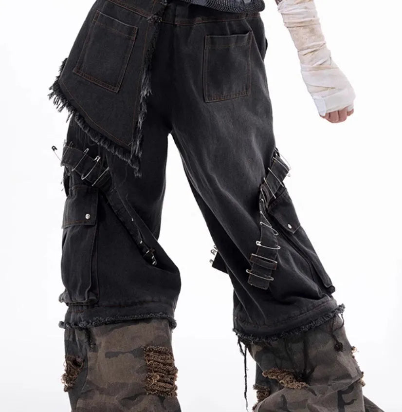 Men's grey camouflage jeans with pin and ribbon splicing detail on the legs.