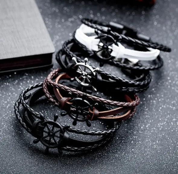 Alloy leather charm bracelet with black clasp fastening in brown colour option