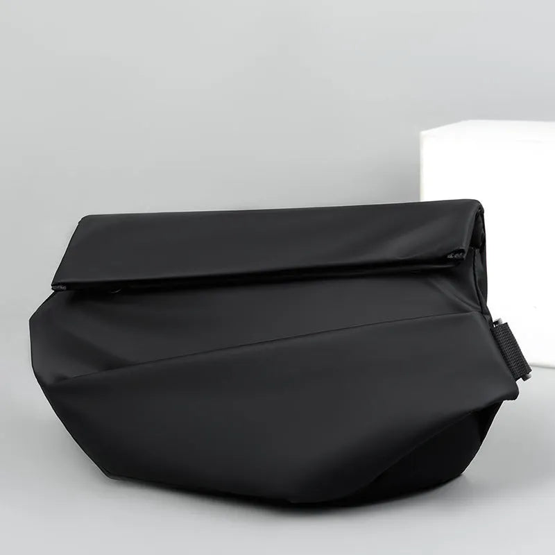 Men's grey PU crossbody chest bag showing zipper opening and adjustable shoulder strap.
