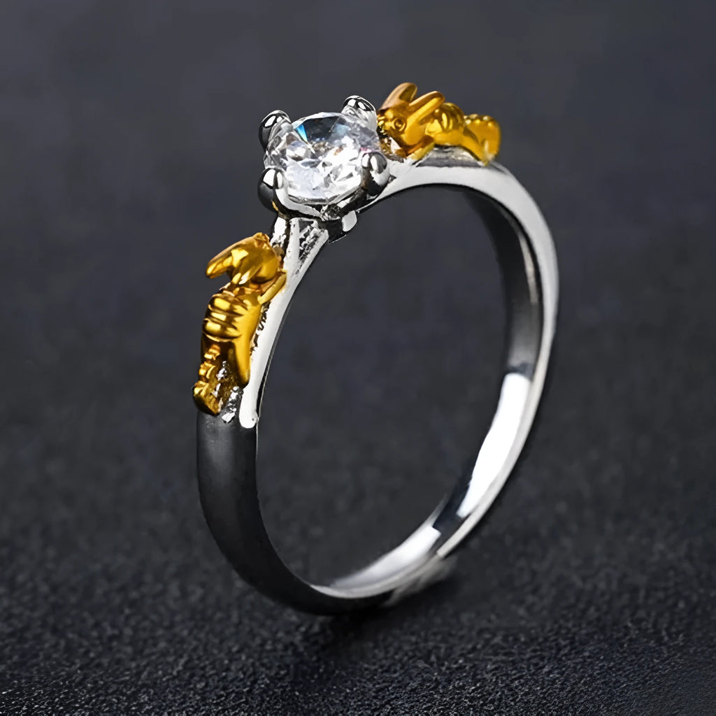Crown-shaped copper cosplay ring with black gold finish and crystal detail.