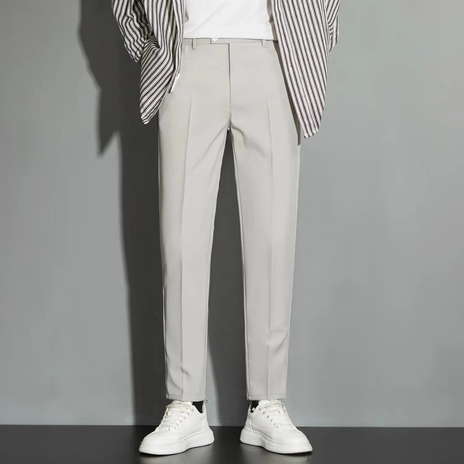 Men's straight ankle-length suit pants in a chemical fibre blend fabric, shown in multiple colours.