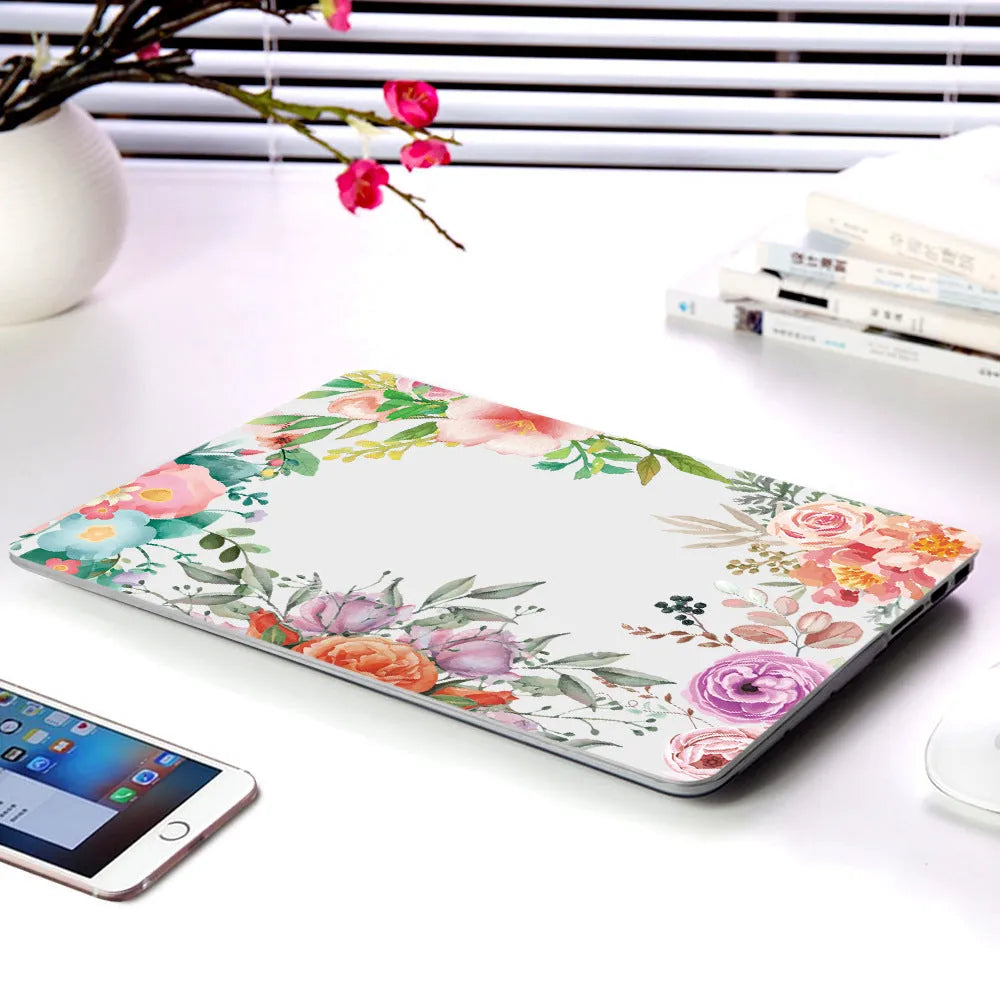 Plastic protective shell for Apple MacBook with partial flower series floral design showing five pattern options