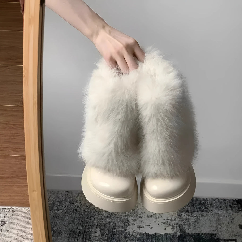 Women's low top snow boots with artificial plush construction and waterproof rubber sole
