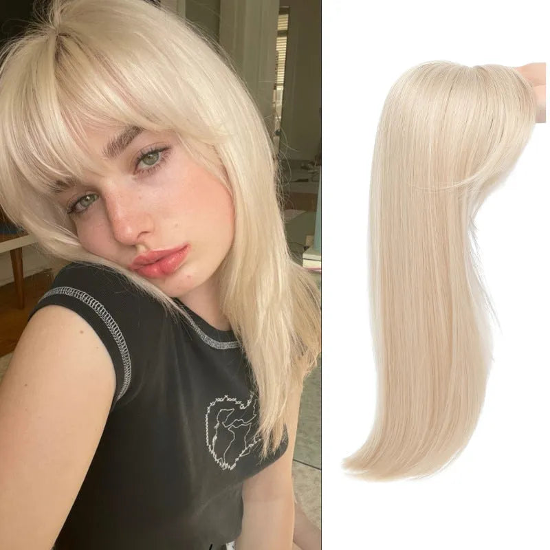 Synthetic high temperature fibre wig hairpiece with inner buckle and hair clip attachment in one of six colour styles.