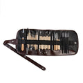 27-piece brown pottery clay tool set with wood, stainless steel and plastic tools rolled in a storage package.