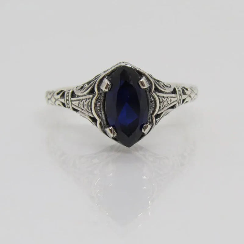 Silver women's geometric hollow ring with zircon detailing on finger