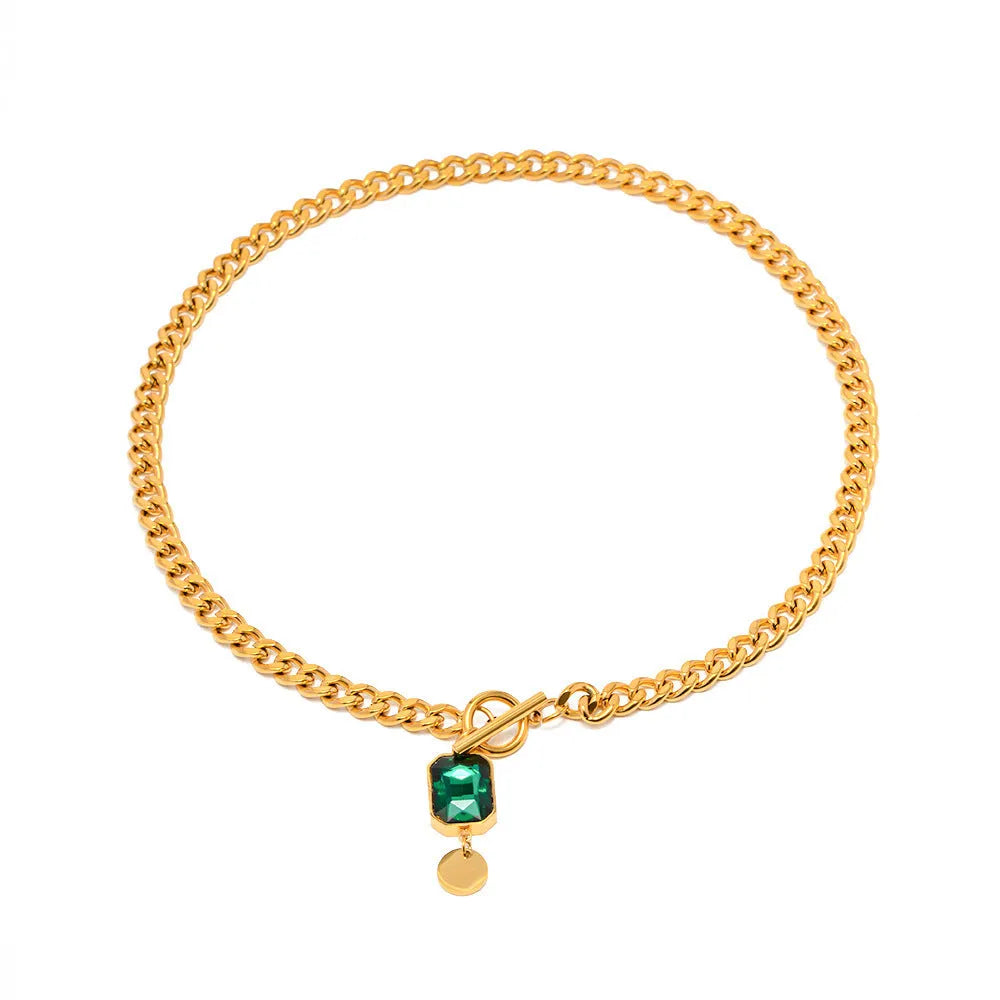 Gold titanium steel necklace with geometric emerald zircon pendant on Cuban link chain