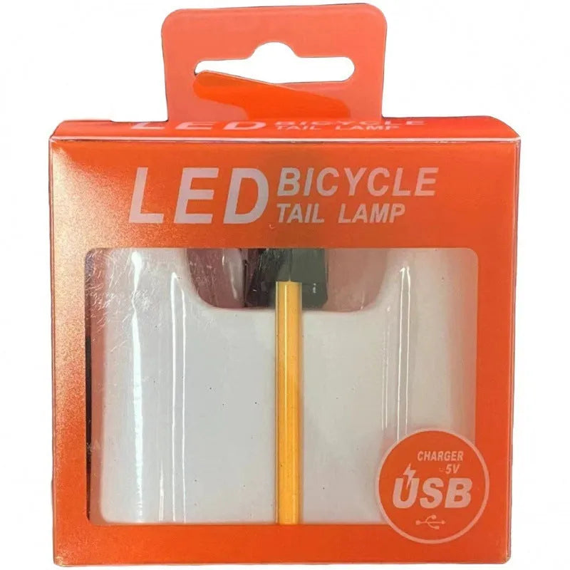 Waterproof USB charging bicycle and motorcycle taillight in blue, pink, red, white, or yellow colour options