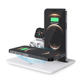 Black and white desktop charging station for wireless phone, watch, and headphone charging with USB cable.
