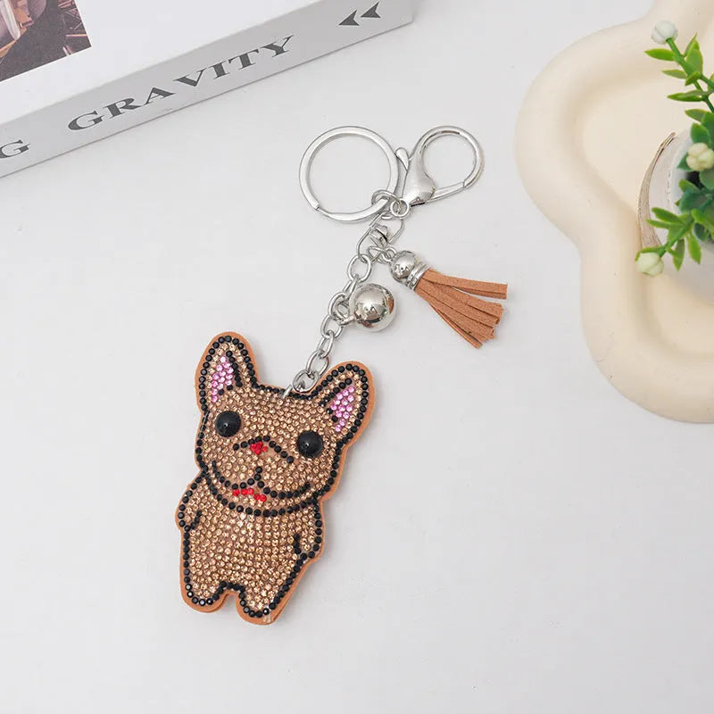 Cartoon animal keychain charm with rhinestones on electroplated alloy in caramel colour