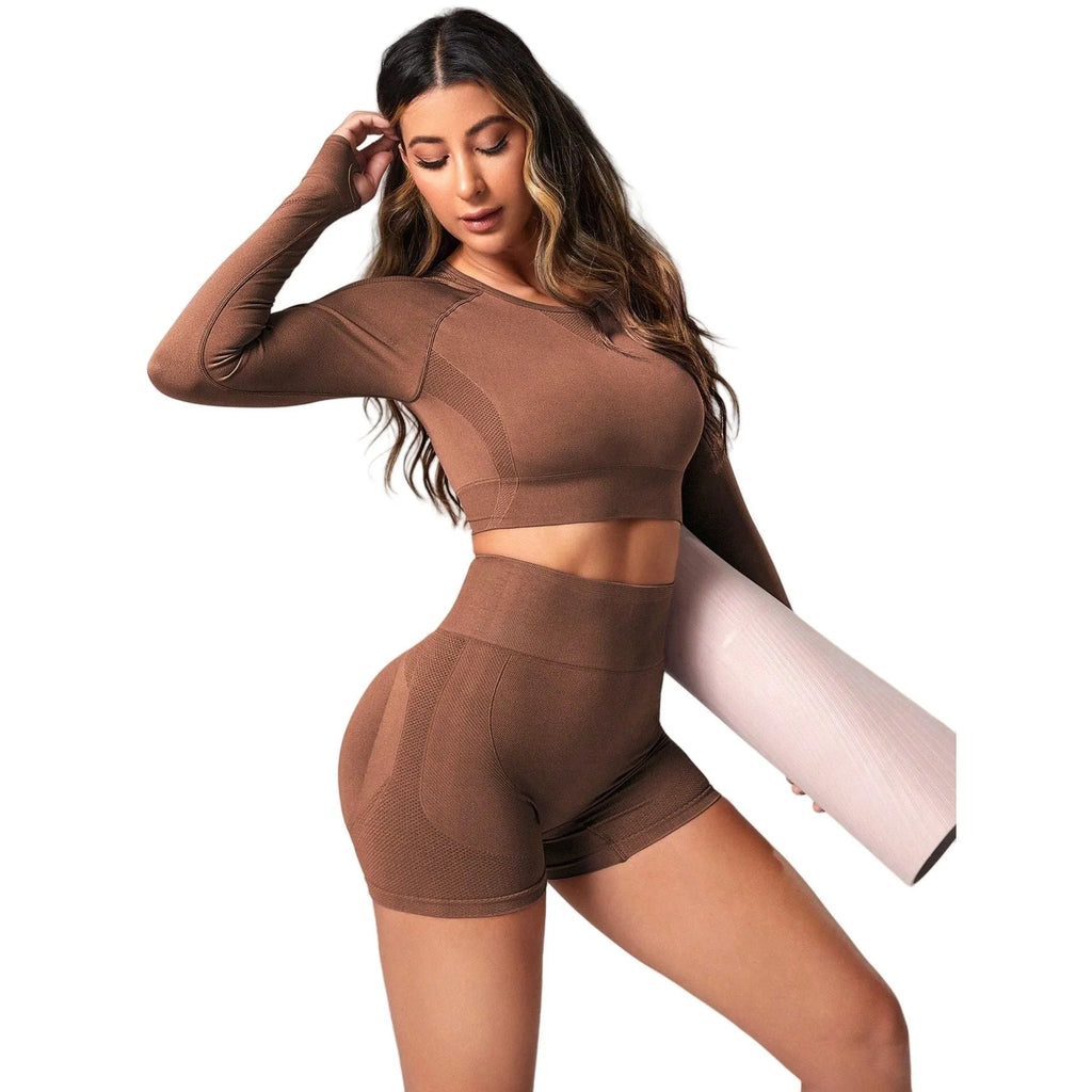 Women's black high waist yoga pants and long sleeve top set made from quick-dry fabric