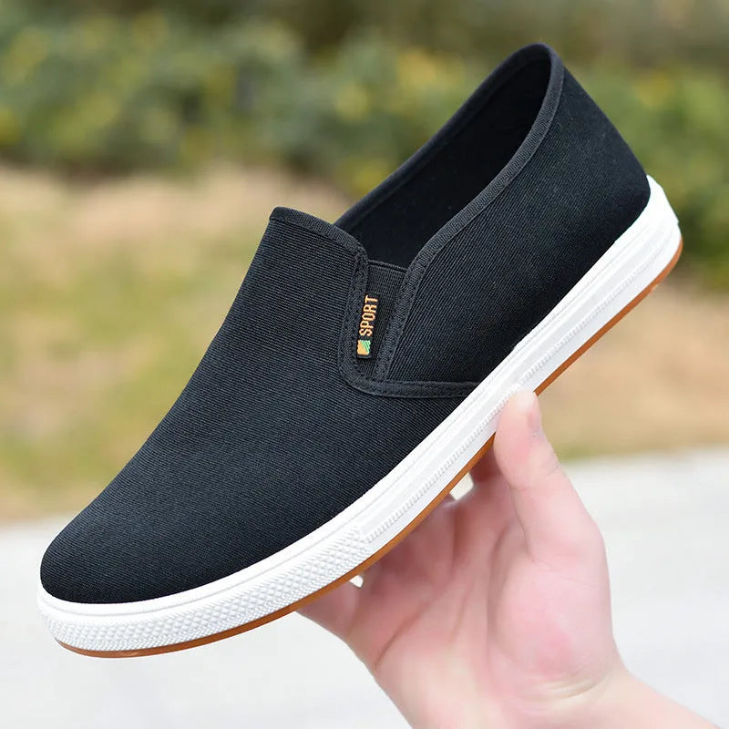 Men's black and blue canvas slip-on shoes with round toe and shallow cutting depth