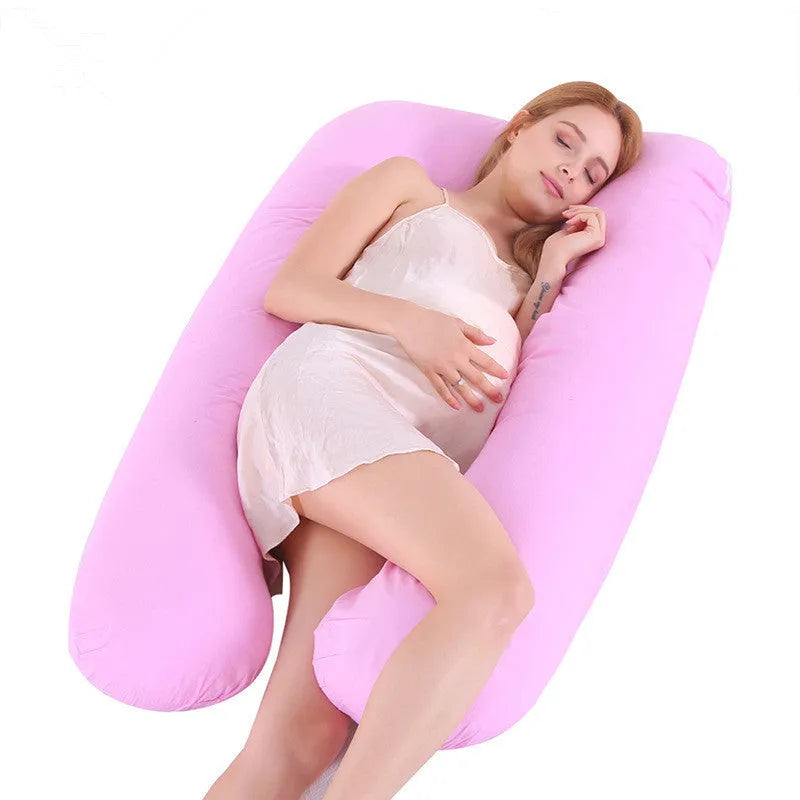 Large U-shaped pregnancy support pillow with removable cover in choice of fabrics.