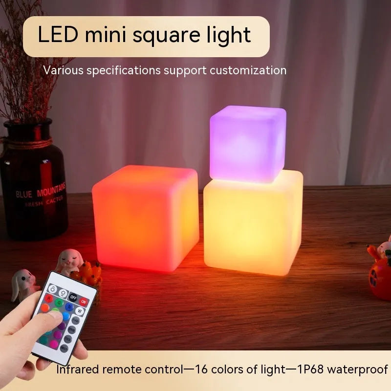 Small square night light showing seven colour changing modes, with remote control.
