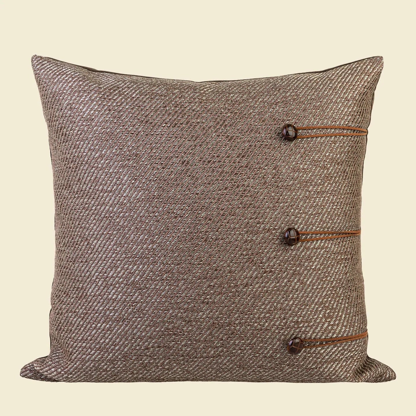 Chinese style square pillow cushion in Maillard colour on a sofa