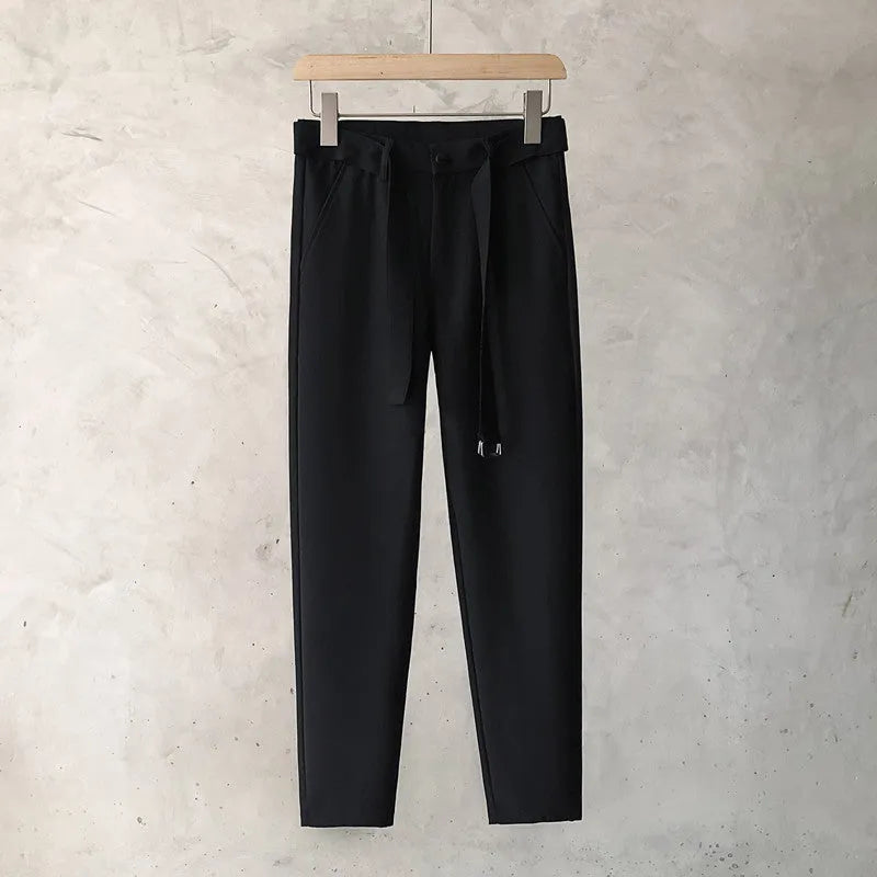 Boys slim straight wool trousers with tapered fit and straight leg opening in black colour
