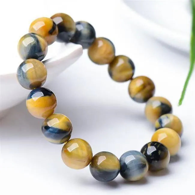 Handmade fantasy tiger eye agate bracelet with round beads in unisex geometric design