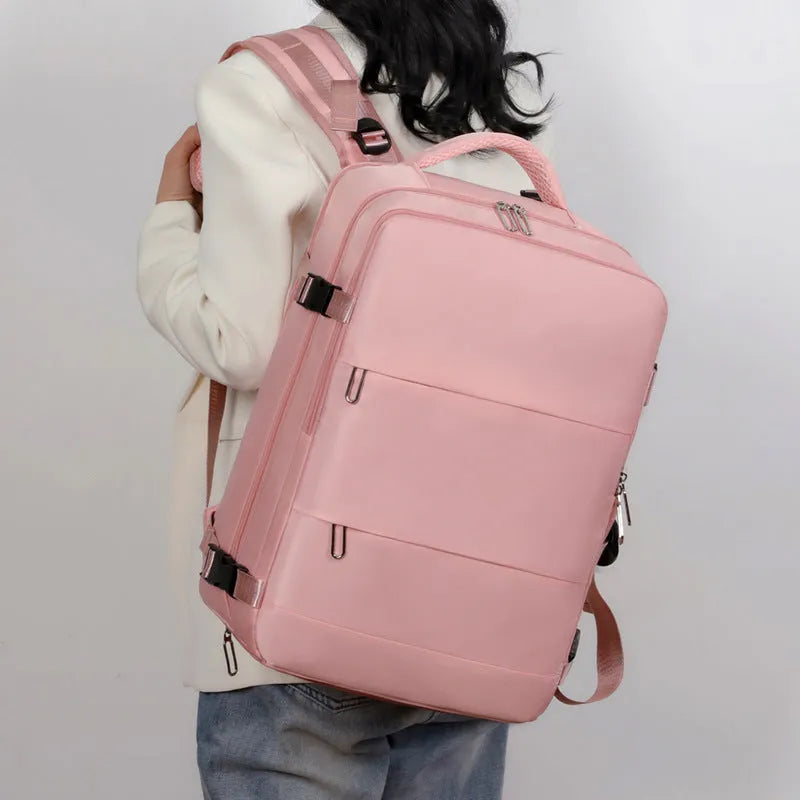 Women's large-capacity travel backpack in purple with organisational compartments and waterproof Oxford cloth construction