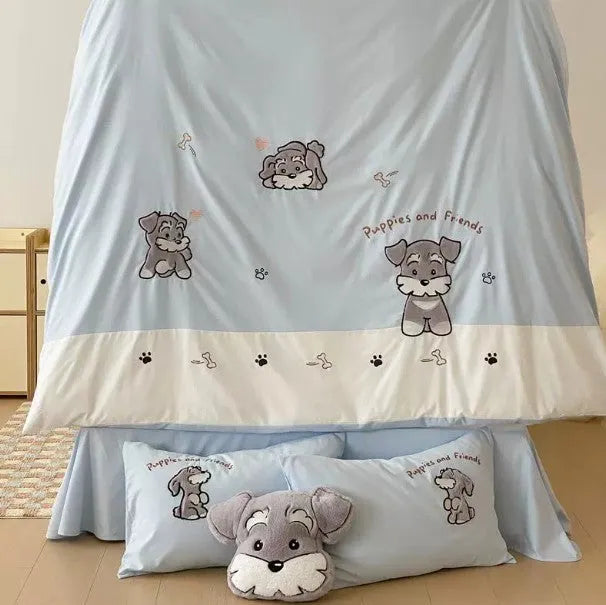 Schnauzer dog cartoon embroidery design on a light-coloured cotton quilt cover and pillowcase from a four-piece bedding set.