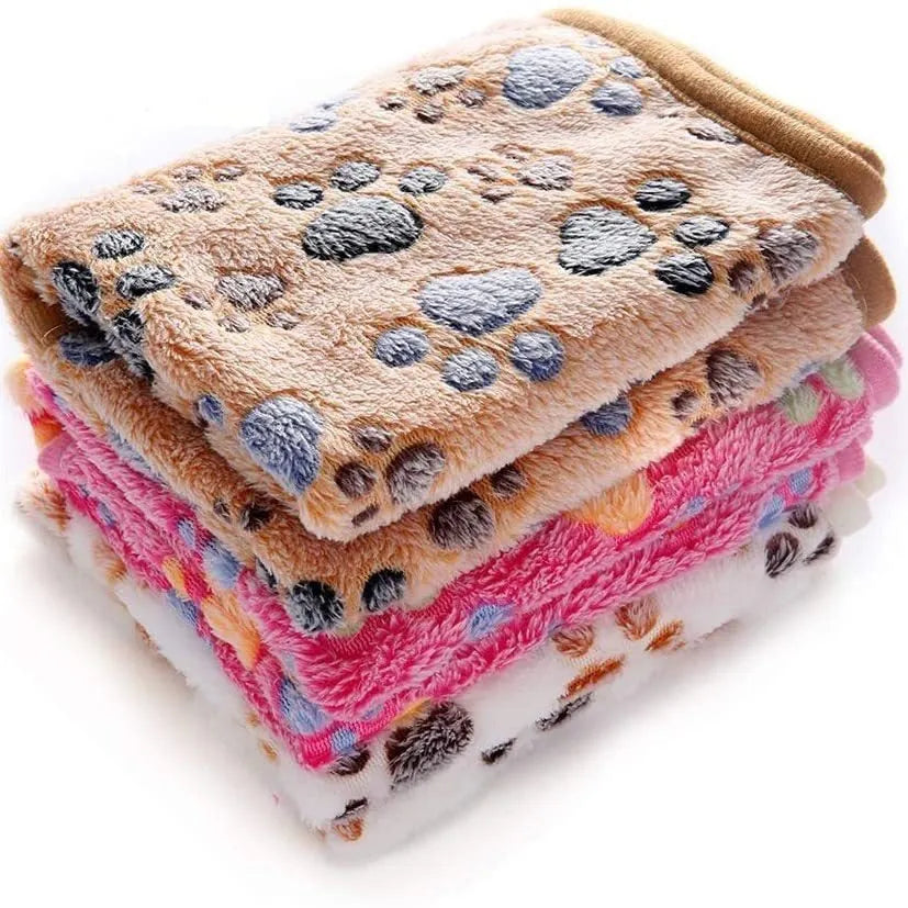 Coral fleece dog blanket with paw print design in multiple colour options