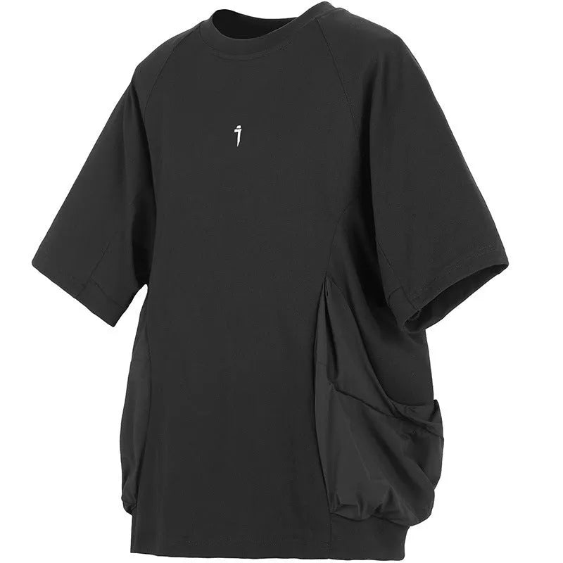 Men's loose fit grey cotton t-shirt with big chest pockets, short sleeves, and a round neck.