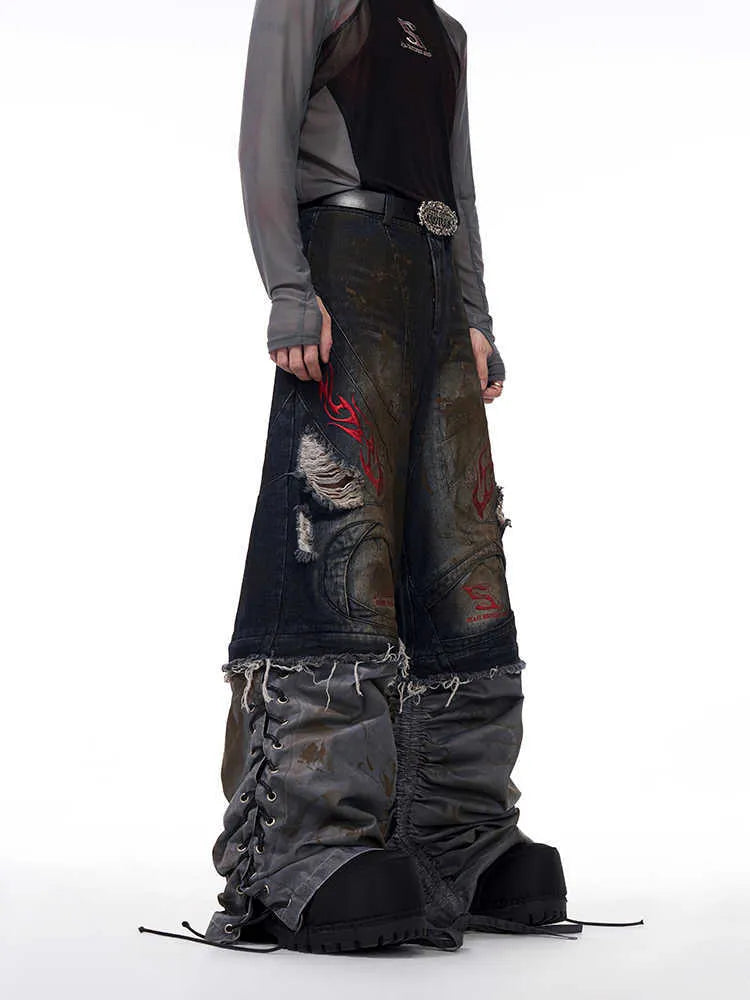 Men's retro jeans with detachable trouser legs showing loose wide-leg fit in picture colour denim