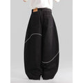 Black straight leg trousers with micro-elastic denim fabric and zip fly opening