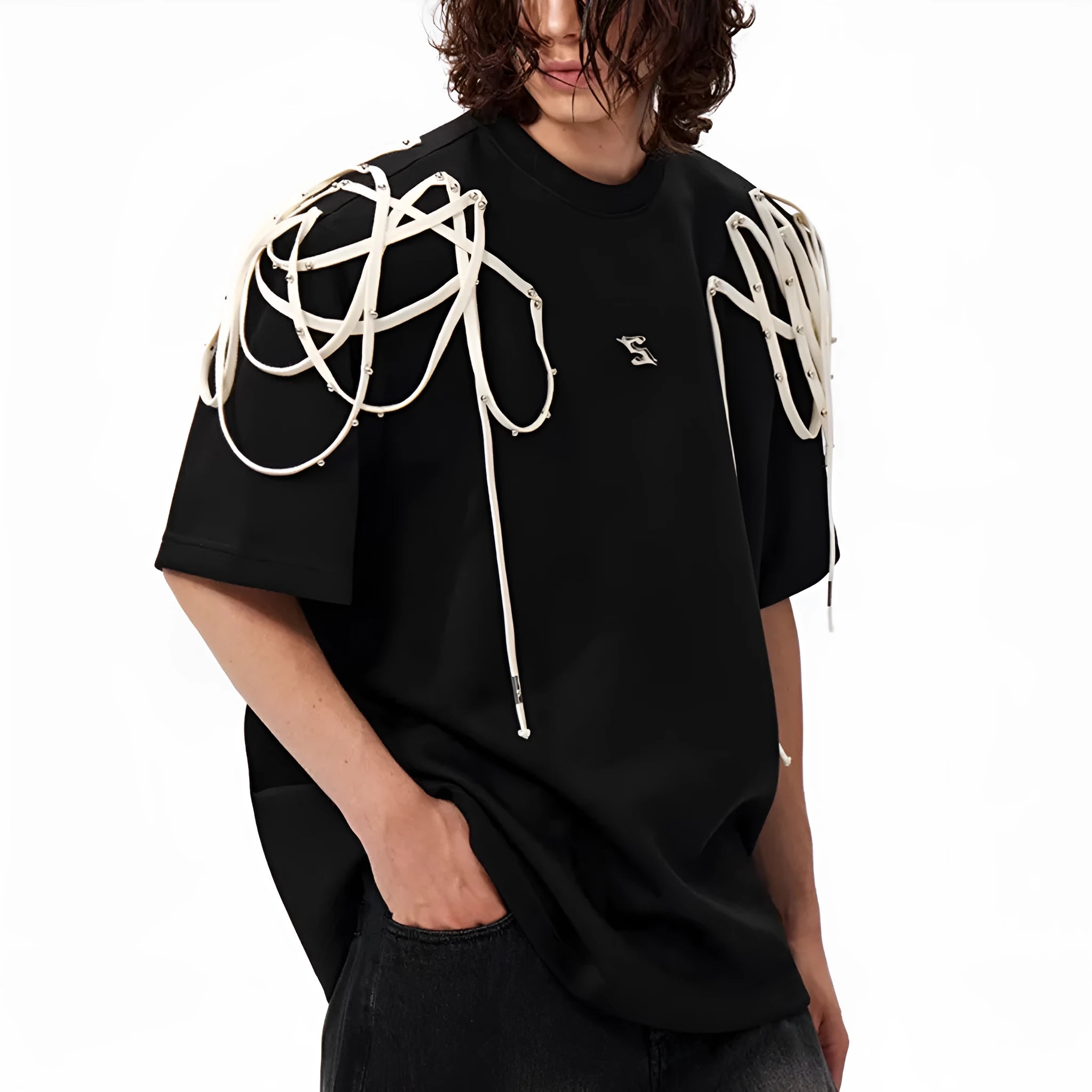 Black loose-fit T-shirt with padded shoulders featuring rivet ribbon detail, short sleeves, and round neck