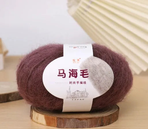 Mohair wool ball for DIY scarf knitting in assorted colours on white background