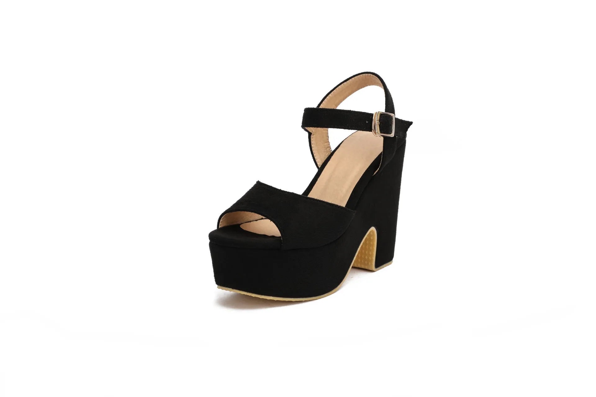 Black suede women's platform sandals with a round toe and ankle strap on a wooden background.