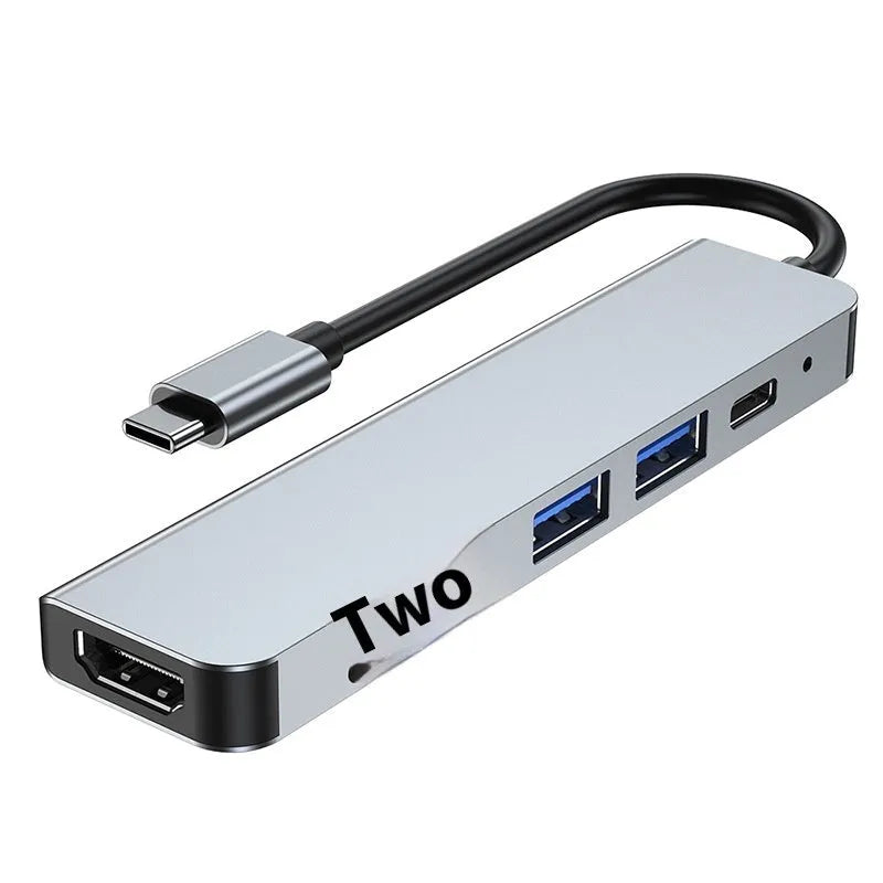 Compact aluminium USB-C expansion dock for laptop and tablet showing multiple port options.