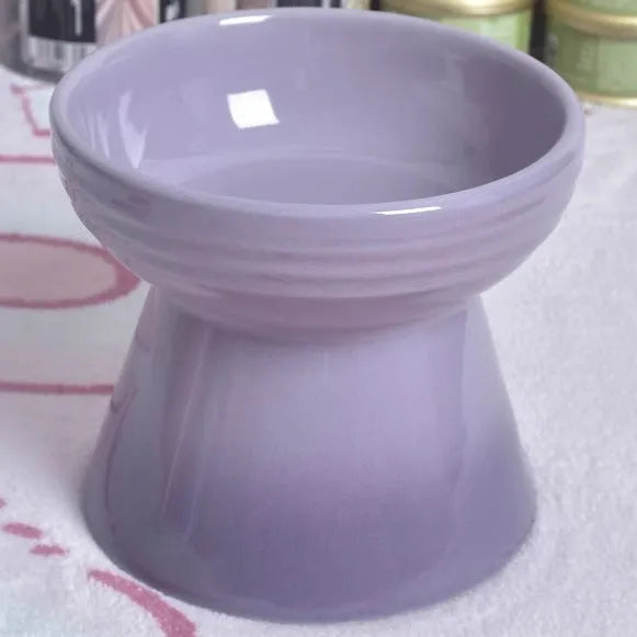 Black ceramic pet bowl with high foot and raised neck for dog or cat feeding