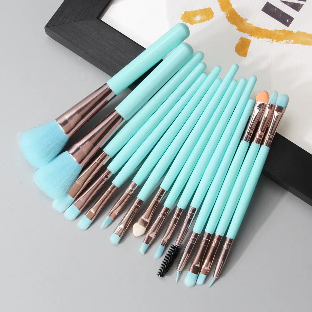18-piece makeup brush set with fan brushes arranged on a table.