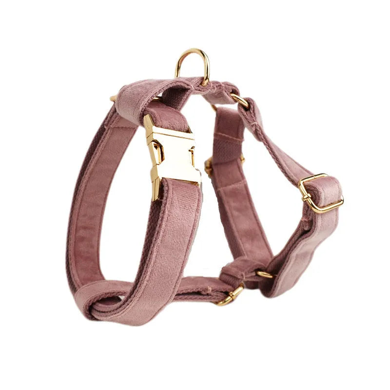 Light purple pink velvet dog collar set with leash and matching accessories on cloth material