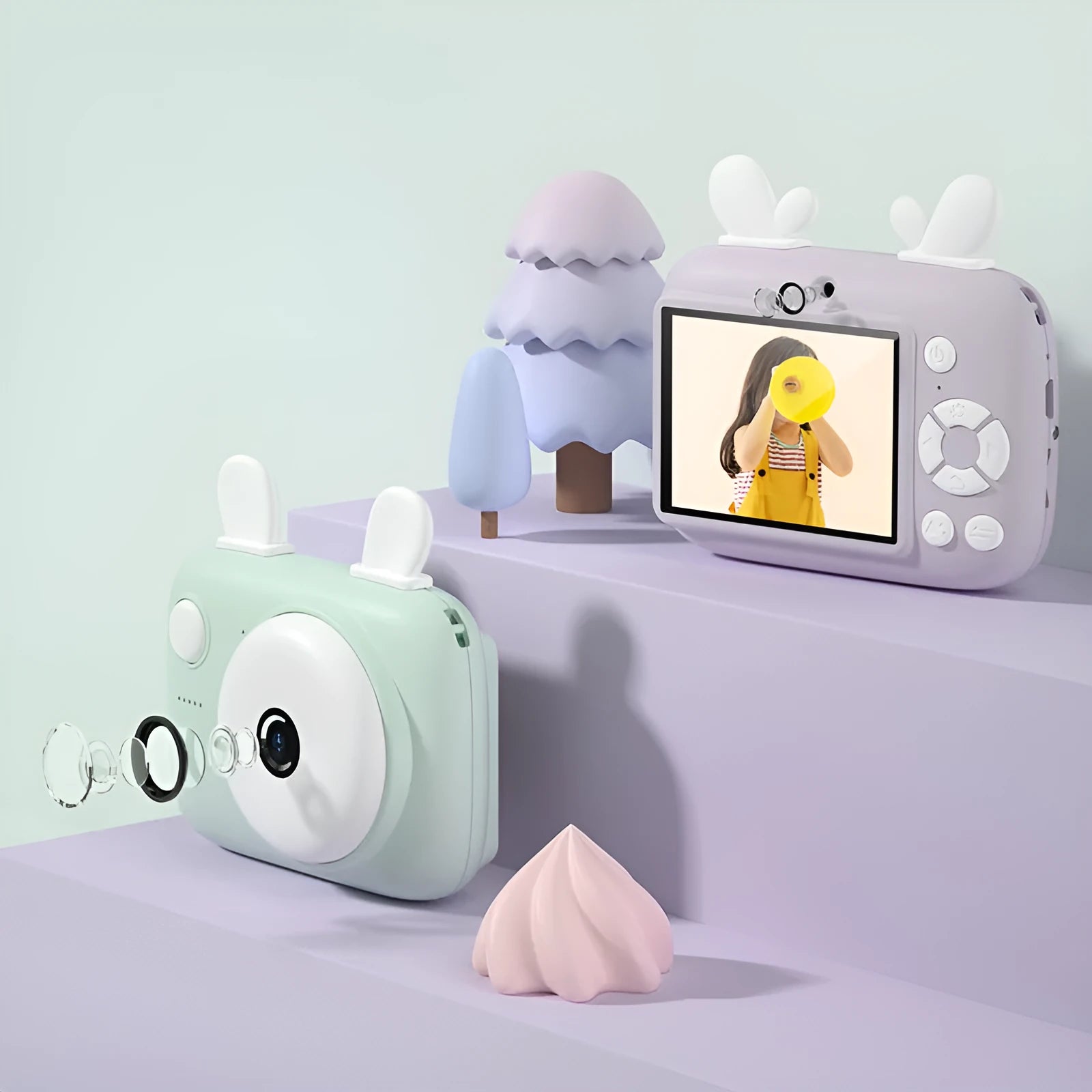 A2 Macaron design kids digital camera in green, showing front and rear lenses and 2.4 inch screen.