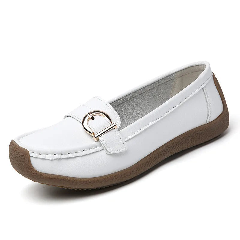 Women's casual flat loafers in artificial PU leather with a rounded toe and beef tendon sole.