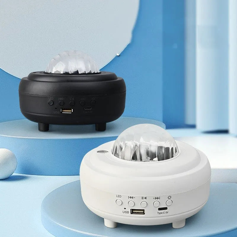 White Bluetooth star projector night light displaying starry sky projection patterns on ceiling