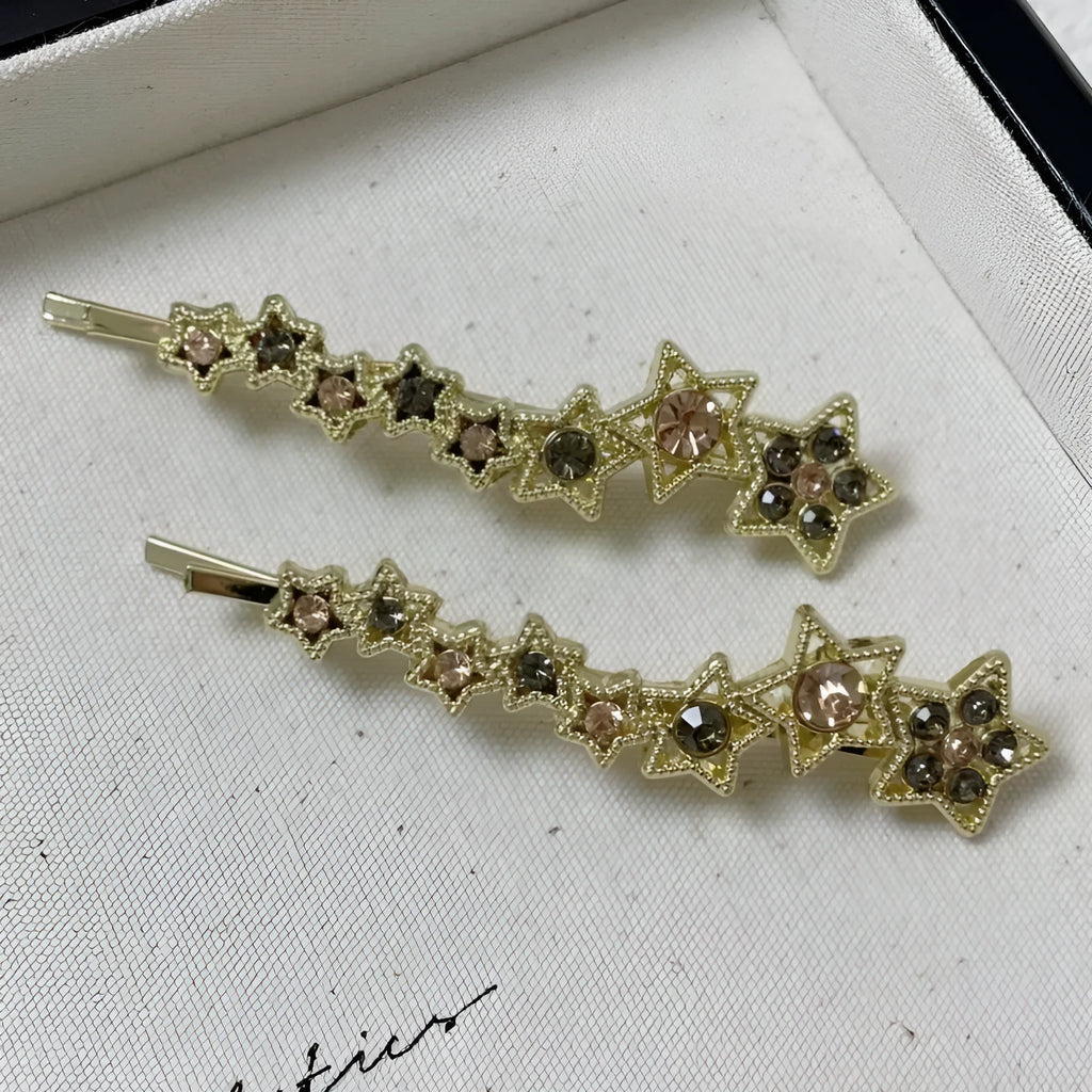 Gold-coloured rhinestone barrette clip with star charm for bangs