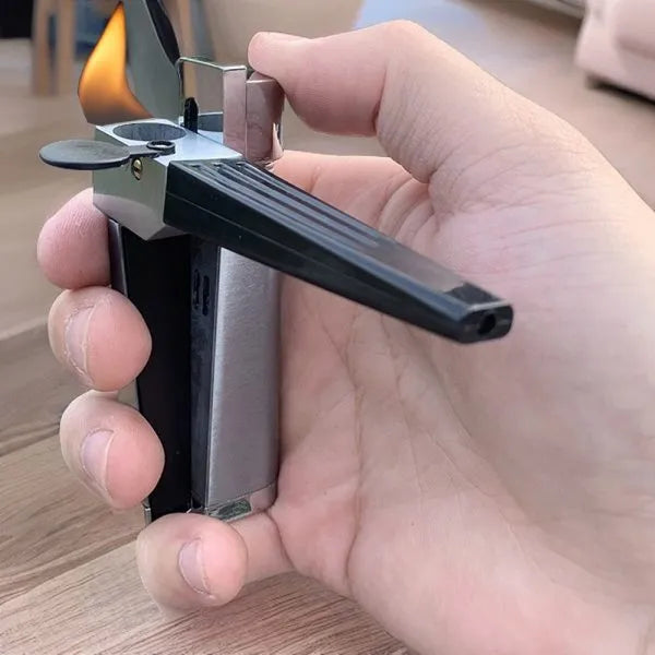 Silver foldable metal pipe lighter shown open, revealing the lighter mechanism and a small stash compartment.
