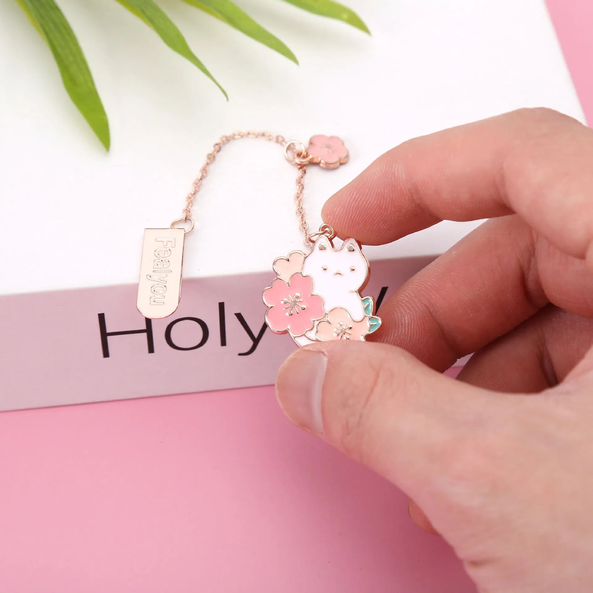 Creative cartoon metal pendant bookmark featuring cherry blossom cat and rabbit designs.