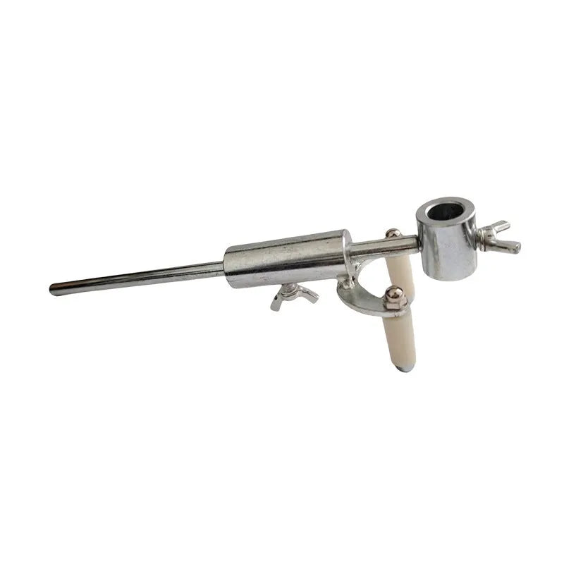 Metal wheel brow scriber depression repair tool on a workbench with a car body panel