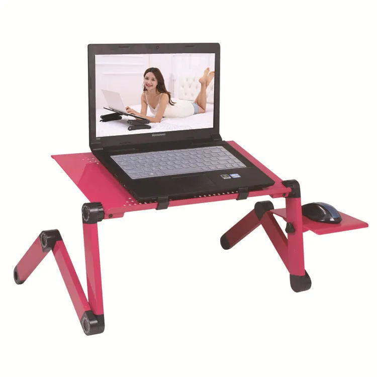 Folding metal computer desk with cooling holes shown in red colour on bed