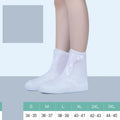 White high-top PVC reusable shoe covers for women, water resistant and anti-skid.